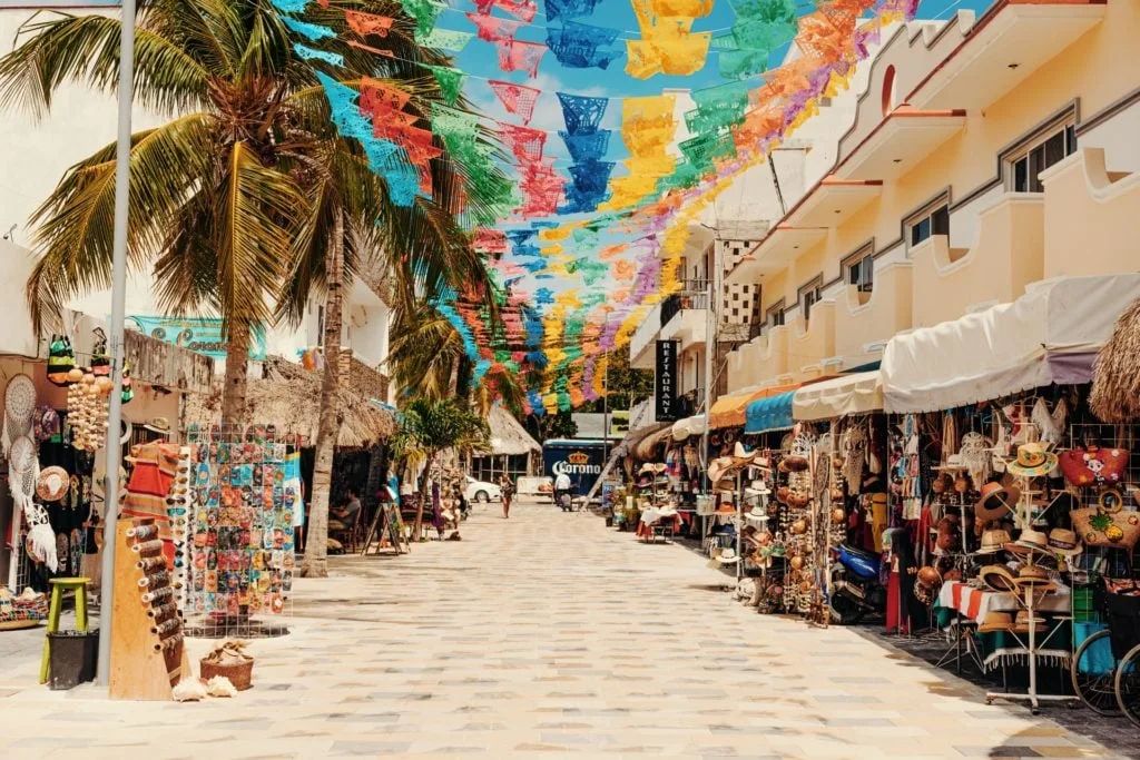 27 Best Things To Do In Playa Del Carmen For An Unforgettable Vacation 1 La Quinta Avenida Best Things To Do In Playa Del Carmen Travels With Elle scaled.jpg